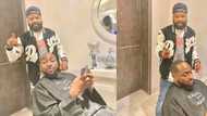 To barb OBO na great achievement: Benue hairstylist celebrates after giving Davido a hair cut in Lagos