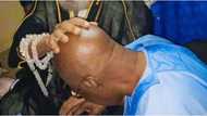 2023: Viral photo as Tinubu goes on his knees while powerful Imam lays hand on his head