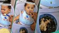 Cute baby enjoys eba and soup at home, rejects cereal, video goes viral