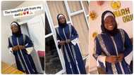 Young lady shows well-equipped tailoring shop her father built for her