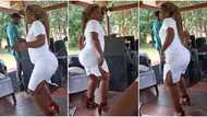 "Who is this?" Elegant lady in white gown dances and shakes waist close to loudspeakers, video goes viral
