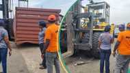 Tragedy as container falls on moving car, kills woman in Lagos