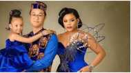 Oyibo man and Nigerian wife rock stylish Isiagu ensembles in cute family photo