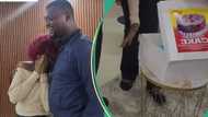 “All his co-workers”: Nigerian lady goes to fiance’s office to present birthday gift, he hugs her