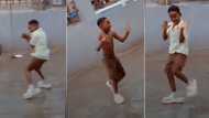 “Under the Rain”: Bold Little Boy in Uniform Tosses Shirt to Do Legwork in Street, Shows off Fire Moves in Viral Video