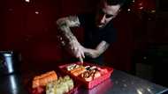 'War is war' but Ukraine sushi bar serves lunch on time
