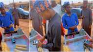 CBN policy: Sugarcane seller goes cashless, puts POS machine in his wheelbarrow as video emerges & goes viral