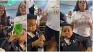 Little boy with '30 BG' chain on his neck drinks beer at event, dances with ladies, video stuns many