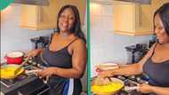 "I miss my roots": UK-based lady buys tubers of cassava, fries garri with pan on gas cooker