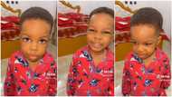 Mum asks 2-year-old child in beautiful pyjamas her name, he gives funny answer, smiles in cute video
