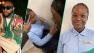 "Nothing will harm U": Davido video calls airport worker he gave $10k, woman goes gaga, prays for singer