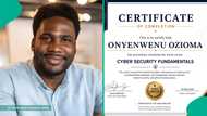 Man displays certificate he received after learning cybersecurity for 4 years