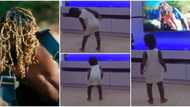 "How demons enter your kids": Small boy stands in front of TV, repeats Asake's 'spiritual' moves in Yoga video
