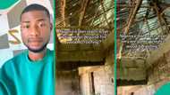 Nigerian man displays building roofed with firewood, posts video: "E don reach this level?"
