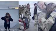 Little girl receives military father's home coming from mum while taking photos, cries joyfully in video
