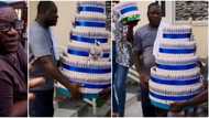 Actor Aina Gold’s family surprise him with 7-tier money cake on his birthday as talking drummers praise him