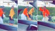 Nigerian man in car laughs as he sees 2 ladies walking in rain, videos them as he renders help