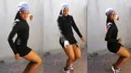 Pretty lady rolls her waist, makes quick leg moves as she dances, video sparks reactions