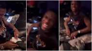 Wizkid spotted being playful in rare video, sprays his friend ‘loud’ instead of money for hailing him