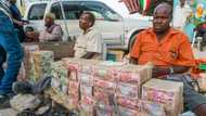 Nigerians react to photos of exchange rate market that looks like Lagos tomato market