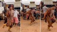 Man dressed as mechanic dances to Kizz Daniel's Buga in video, Nigerians react