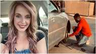 Man helps oyinbo lady whose car broke down on the road, uses his tyre for her, rejects reward