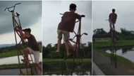 Young boy causes massive stir online with his tall bicycle as he displays skills while maintaining balance