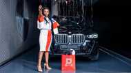 Beautiful lady who started as company's receptionist buys new car, photos stir reactions