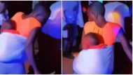 Woman carrying baby at her back causes stir at party with her dance moves, video gets reactions
