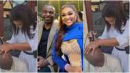 I can do this with blade and soap: Mixed reactions as Mercy Aigbe gives husband clean haircut in video