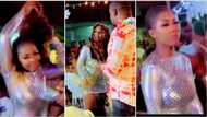 What's happening? Lady in short gown removes her wig, distracts men with cool waist dance, video goes viral