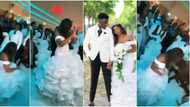 Bride in long white gown scatters dancefloor with amazing steps, teaches bridesmaid, groomsmen how to dance