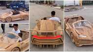 Man builds a Bugatti out of wood for his son, rides the car on the road alongside real cars in viral video