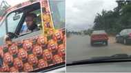 Authentically Naija made: Man cruises around town with car painted in Isi-Agu colours, video stuns Nigerians