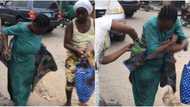 Moment pregnant woman gives birth on the road in Lagos (video)