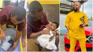"Tomorrow they'll say I'm not a good husband": Actor Dike Osinachi bathes cute look-alike baby, shares photos