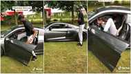 Tall man bends gently to fit himself into a sportscar in viral video, many people react