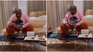 "Only u dey play, only u still dey fail": Don Jazzy joins bottle flip challenge, eats plate of 'nkwobi' alone