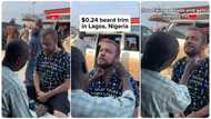Foreigner who comes to Nigeria for holiday, heads to the street to have clean shave with local barbers
