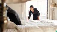 Couple catch hotel cleaner stealing from them after setting secret cameras in room, video emerges
