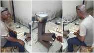 "Make it wider": Creative Nigerian man builds tall firewood stove, uses it to boil water under 5 minutes