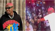 Award him best in being harassed: Funny reactions as female fan forcefully kissed Ruger on stage in Australia