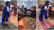"I claim this": Women lay wrappers for fresh graduate to walk on as she returns home, cute video trends