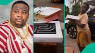 Cubana Chiefpriest rewards son’s leadership skill with MacBook: "His kid bro broke his laptop"