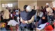 "He has another plan": Secondary school boy walks like a king towards girl & hugs her, classmates scream