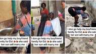 "She said her son will marry me": Nigerian lady works hard for boyfriend's mum, washes plates in video