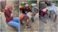 "Who send you?" Nigerian lady climbs Olumo Rock, becomes scared to go further, cries for help in video