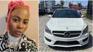 As e dey hot: Female rapper Candy Bleakz joins Benz gang, flaunts fancy new ride in photos