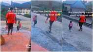 Kid in uniform stays close to dad in video, ignores mum's call as he takes her to school
