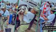 Female corper welcomed by her man and dog in grand style after leaving NYSC orientation camp